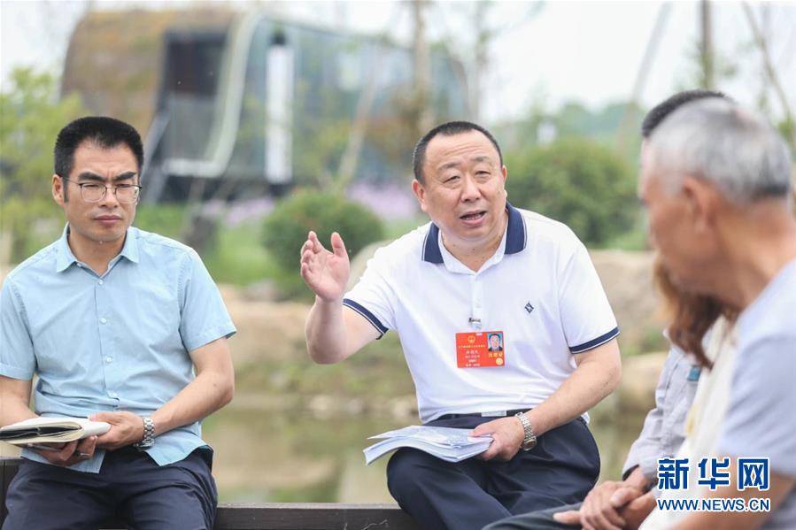 （新華全媒頭條·兩會精神看落實·圖文互動）（2）整體謀劃、系統(tǒng)升級、全面提升——落實全國兩會精神織牢織密公共衛(wèi)生防護(hù)網(wǎng)