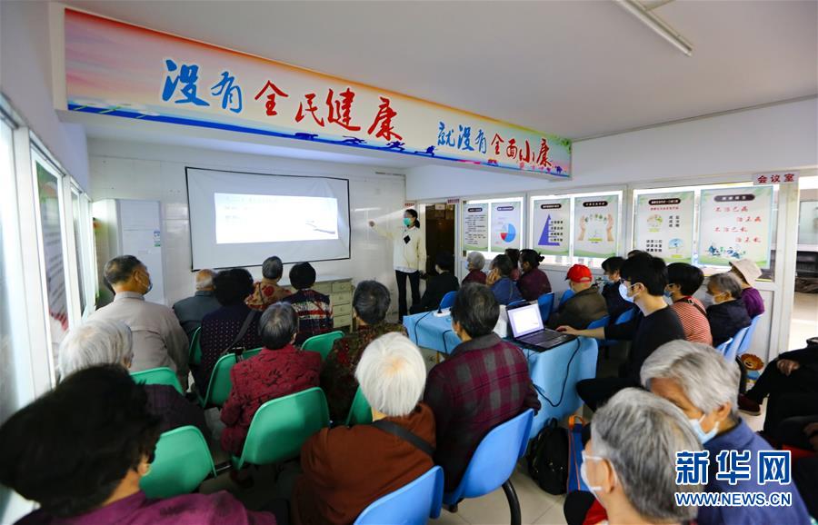 （新華全媒頭條·兩會精神看落實·圖文互動）（3）整體謀劃、系統(tǒng)升級、全面提升——落實全國兩會精神織牢織密公共衛(wèi)生防護(hù)網(wǎng)