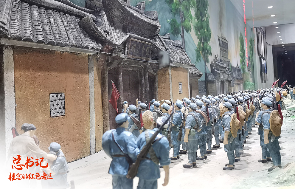 這是在福建省長(zhǎng)汀縣中復(fù)村拍攝的紅軍長(zhǎng)征出發(fā)動(dòng)員會(huì)微型雕塑（2021年4月27日攝）。